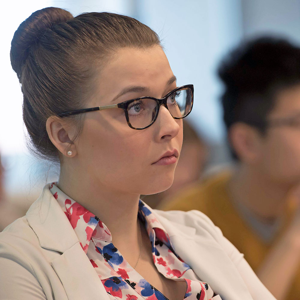 student in a classroom lecture