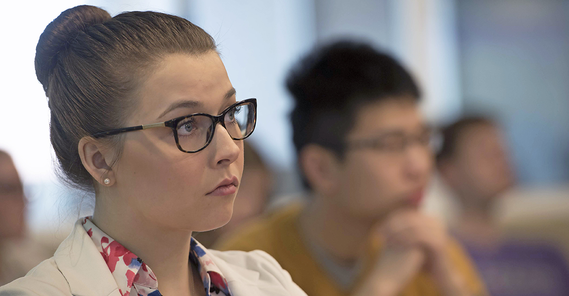 student in classroom lecture