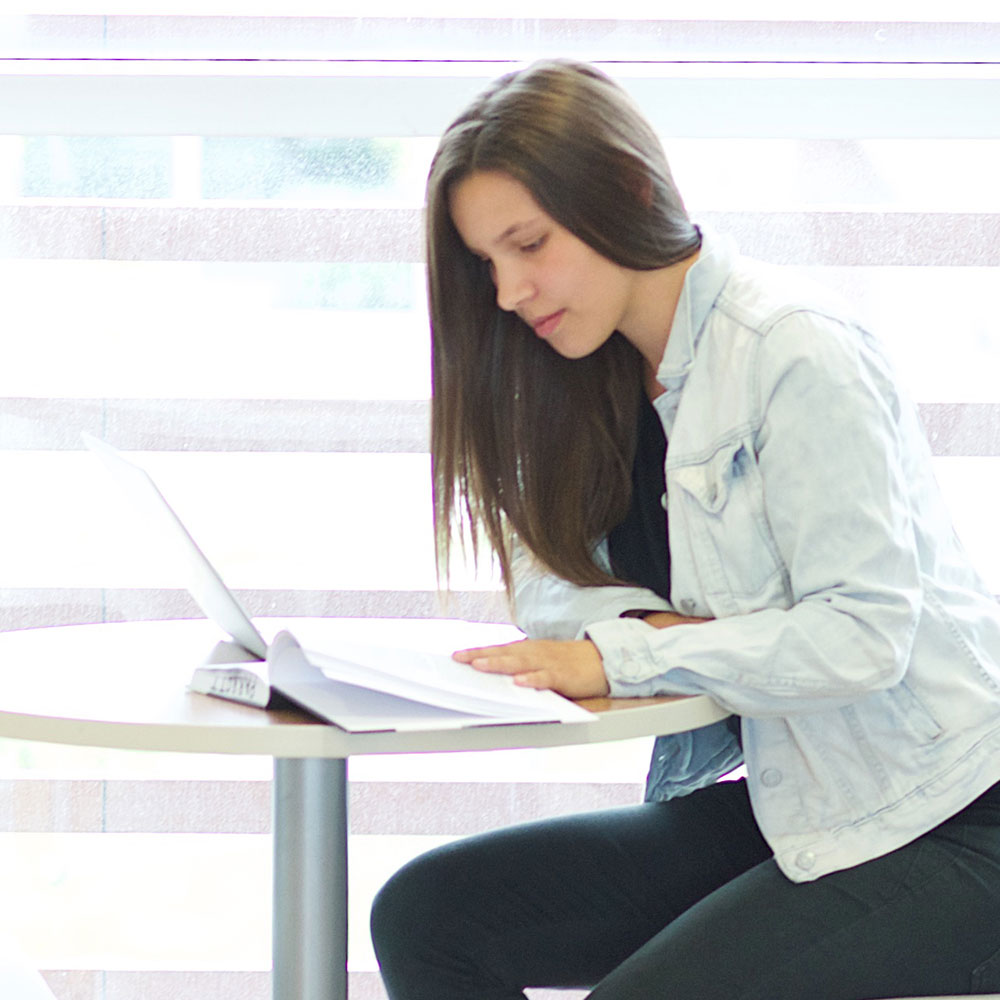 student working on computer