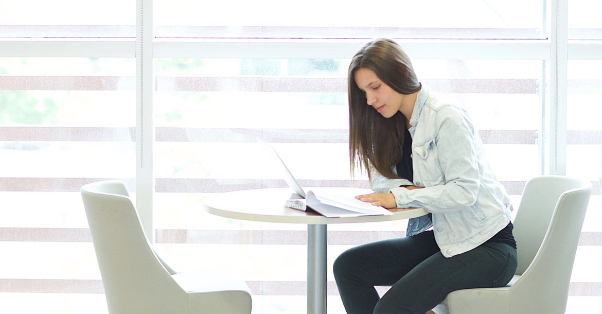 student working on computer