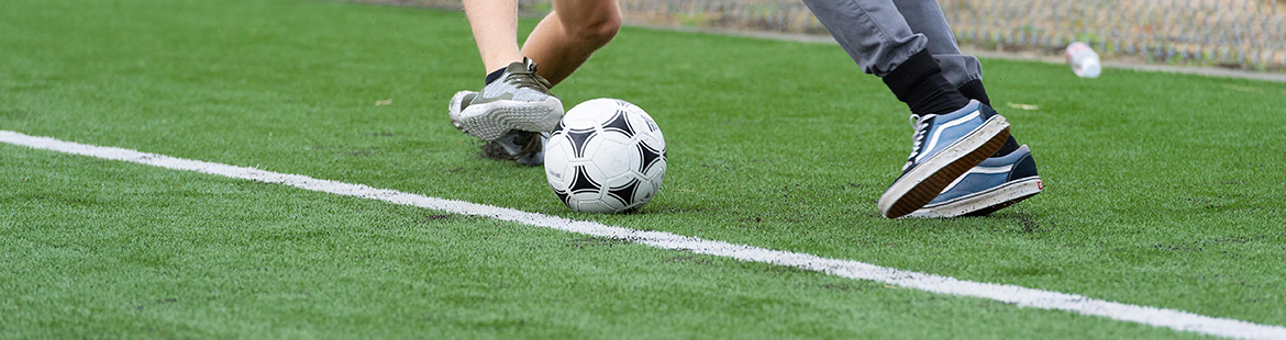 students playing soccer