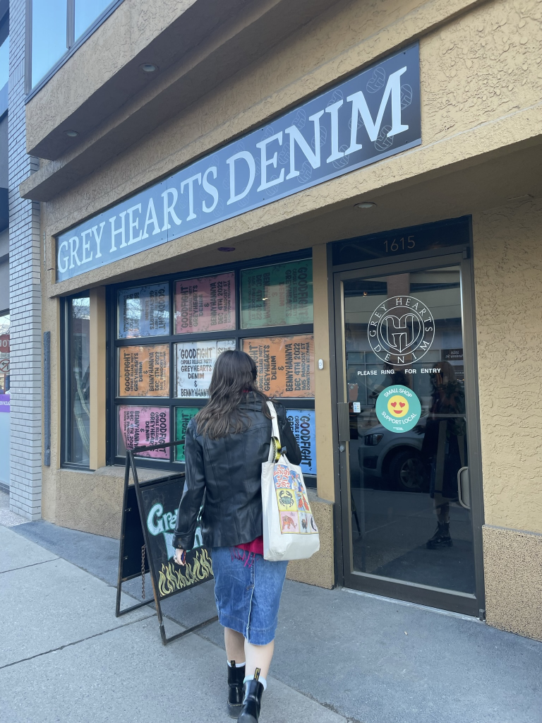 Walking into the entrance of Grey Hearts Denim