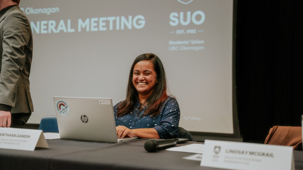 Woman at a computer at SUO meeting